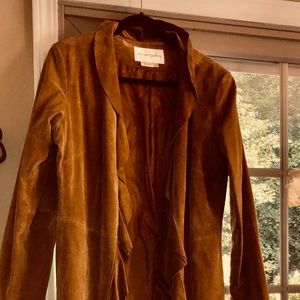 Woman’s long suede ruffle coat